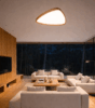 Exclusive Trilum WoodLED TRIGI wooden luminaire in a modern interior, delivering soft diffused LED light with a focus on craftsmanship and detail.